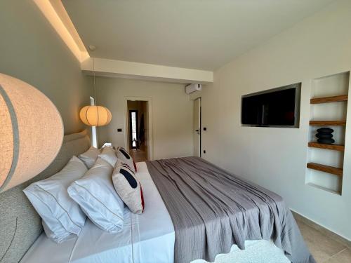 Ένα ή περισσότερα κρεβάτια σε δωμάτιο στο Kisterna Luxury Living