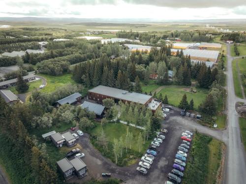 an aerial view of a parking lot with cars at Blue View Cabins in Reykholt