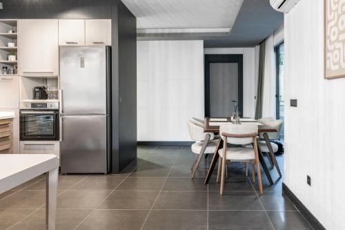 Photo de la galerie de l'établissement Olive Apartment, à Sveti Stefan