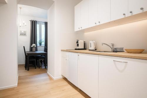 Una cocina o zona de cocina en DAINN Apartments Schönbrunn