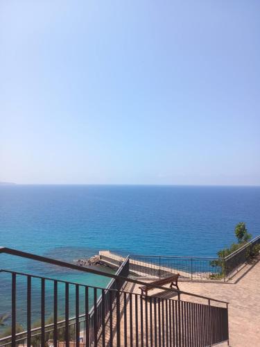a view of the ocean from a balcony at Palazzo Sardanelli in Pizzo