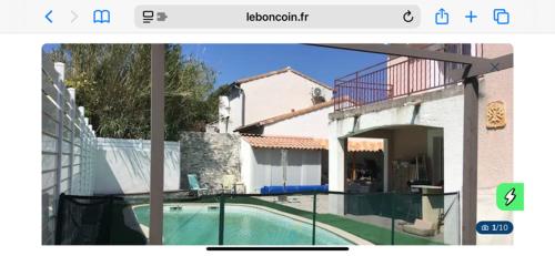 une photo d'une maison avec une piscine dans l'établissement Villa avec piscine spacieuse, à Saint-Jean-de-Védas