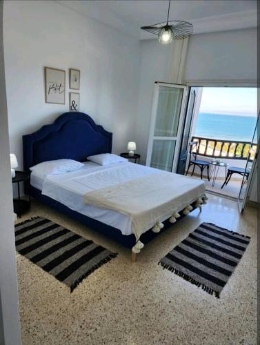 Ένα ή περισσότερα κρεβάτια σε δωμάτιο στο Blue view appartement