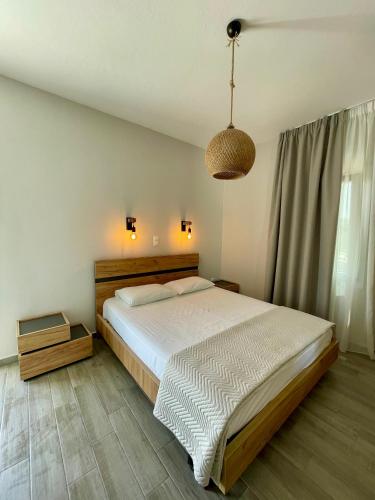Una cama o camas en una habitación de Mare Monte Studios Naxos