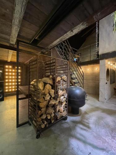 a room with a rack full of fire wood at Månpalatset in Lärbro