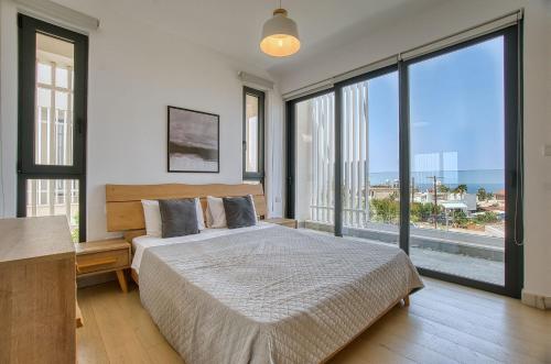 Ένα ή περισσότερα κρεβάτια σε δωμάτιο στο Avalon 1 Villa 14