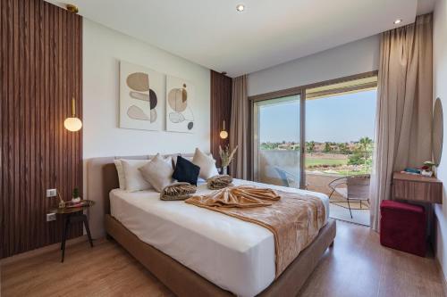Ένα ή περισσότερα κρεβάτια σε δωμάτιο στο Alma Prestigia Appartments