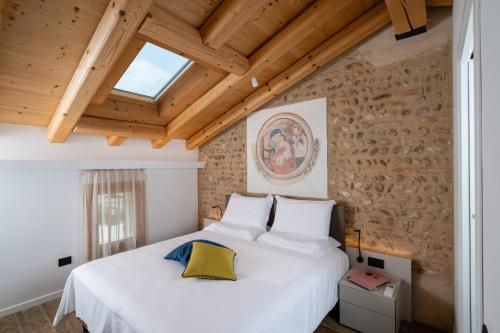 Postel nebo postele na pokoji v ubytování Borgo Paolin - Camere in vigna
