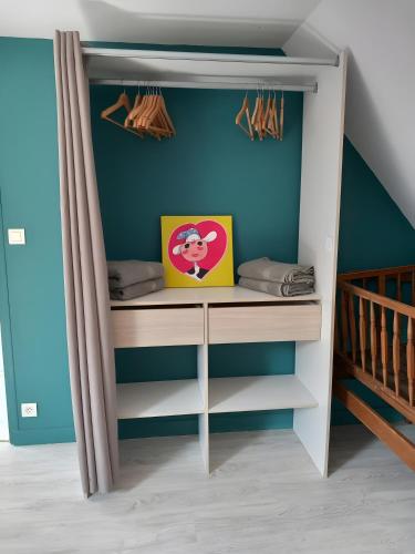 Una cama o camas en una habitación de Gîte De L'alliance