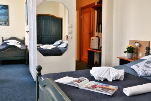 Postel nebo postele na pokoji v ubytování Villa Nautilus