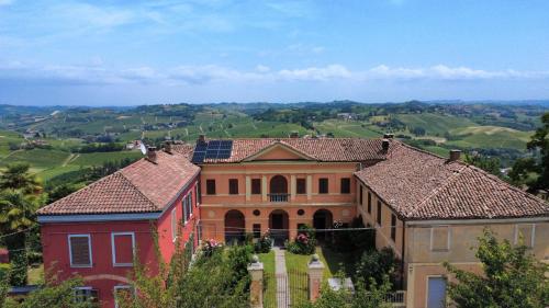 a large house with a view of the countryside at Casa Paolina in Agliano Terme
