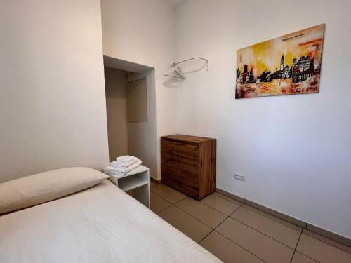 Postel nebo postele na pokoji v ubytování Dreams Lodge