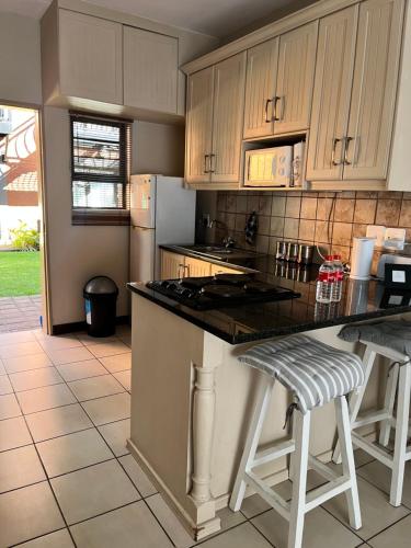 Kuchyň nebo kuchyňský kout v ubytování Apartel 477 on Bains