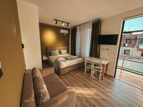 Postel nebo postele na pokoji v ubytování Relaxx Apartment & Hotel