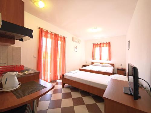 Postel nebo postele na pokoji v ubytování Guest House Anika