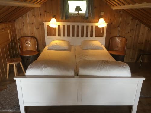 Postelja oz. postelje v sobi nastanitve Augustas Bed & Breakfast