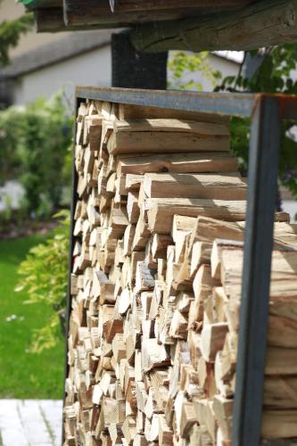 a pile of wood sitting on top of a table at Ferienhotel Bodensee in Berlingen