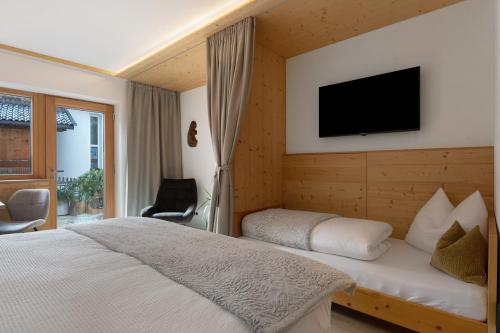 Ein Bett oder Betten in einem Zimmer der Unterkunft Schartenblick