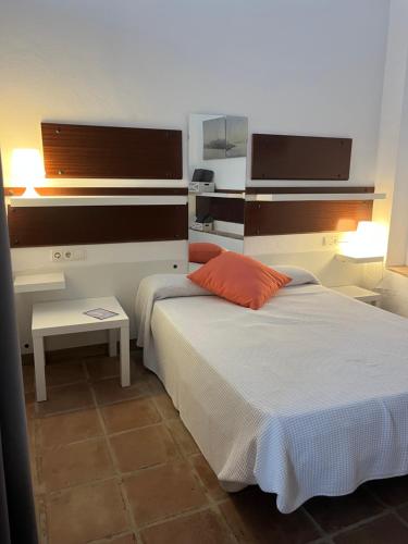 Ένα ή περισσότερα κρεβάτια σε δωμάτιο στο Apartamento vistas golf y Bahia