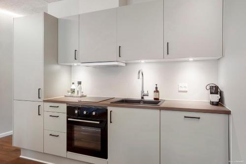 Una cocina o zona de cocina en Midtown Nest