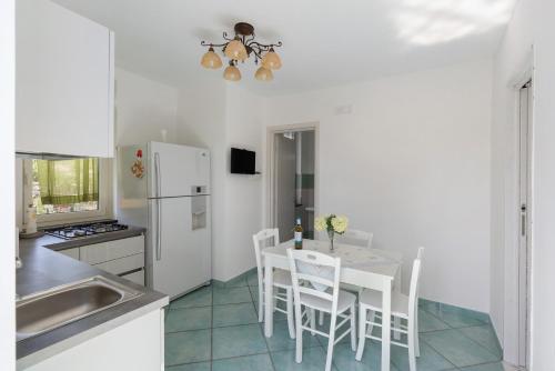Η κουζίνα ή μικρή κουζίνα στο Villa Degli Dei