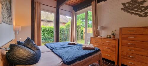 Postel nebo postele na pokoji v ubytování Thiedes Hus