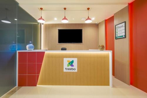 TV a/nebo společenská místnost v ubytování Treebo Nestlay Rooms Whitefield