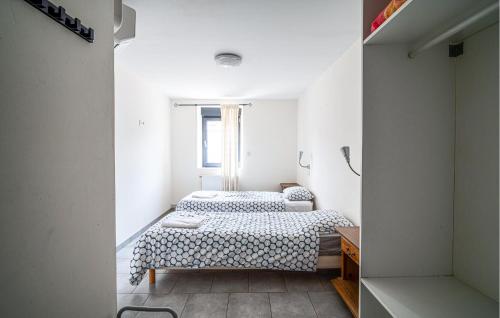 Katil atau katil-katil dalam bilik di Appartement Vue Sur La Meuse