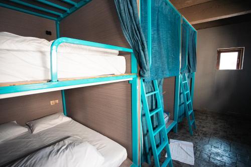 Postel nebo postele na pokoji v ubytování TT Premium Hostel Vientiane