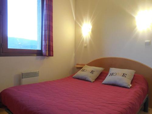Postel nebo postele na pokoji v ubytování Appartement confortable à Ignaux, 31 m² avec piscine