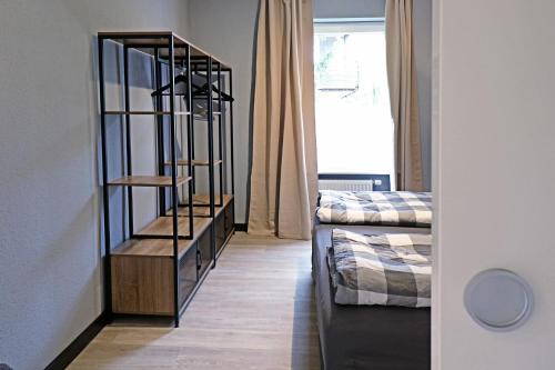 Postel nebo postele na pokoji v ubytování Harzbeat