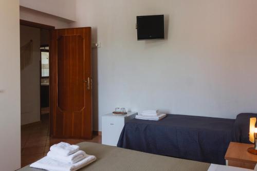 Postel nebo postele na pokoji v ubytování Vbeb Macrame Rooms Agrigento