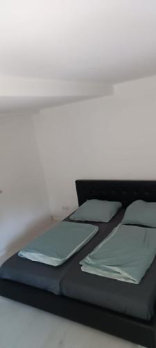Katil atau katil-katil dalam bilik di Cosy Apartment Geislingen