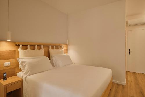 Hotel Le Muraにあるベッド