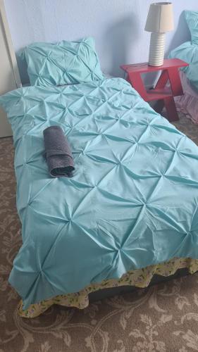 Ένα ή περισσότερα κρεβάτια σε δωμάτιο στο one floor of rooms 9-11persons