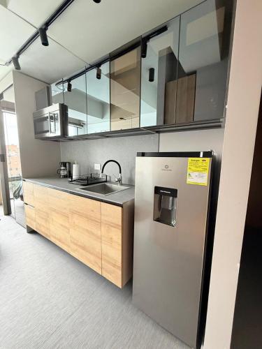 Η κουζίνα ή μικρή κουζίνα στο Unique Luxury Loft 715
