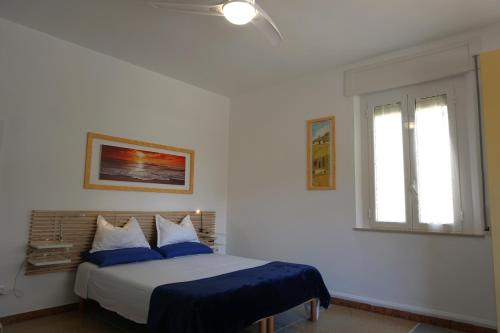 Postel nebo postele na pokoji v ubytování Casa Flora