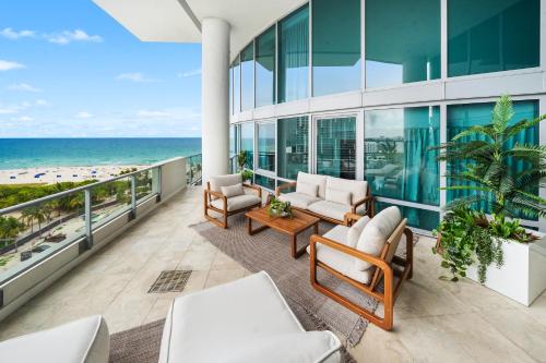 a view of the beach from the balcony of a building at Oceanview Private Townhouse at The Setai 1505-THB in Miami Beach