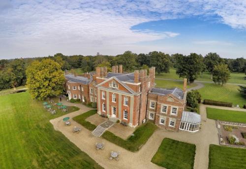 an aerial view of a large house with a yard at Warbrook House Heritage Hotel in Hook