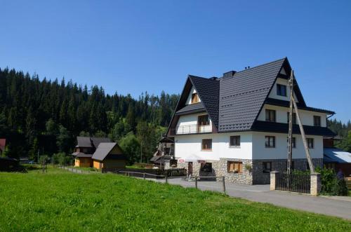 Το κτήριο όπου στεγάζεται  το δωμάτιο σε οικογενειακή κατοικία