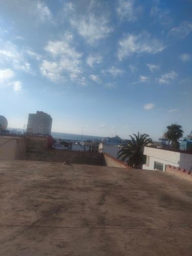 a view from the roof of a building with palm trees at Alba 2 apartamento y Alba 3 habitación con baño in Puerto del Rosario