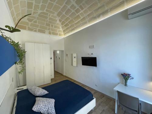 Televízia a/alebo spoločenská miestnosť v ubytovaní Sea View Teti Rooms & Apts