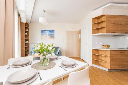 Η κουζίνα ή μικρή κουζίνα στο Flatbook Apartamenty - Kąty Rybackie I