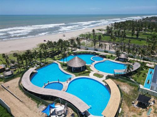 an aerial view of a resort with a beach at Casa Acapulco de mis amores Diamante in Icacos