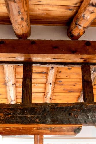 a wooden ceiling of a building with wooden beams at Casa Rural Vistes de Morella in Morella