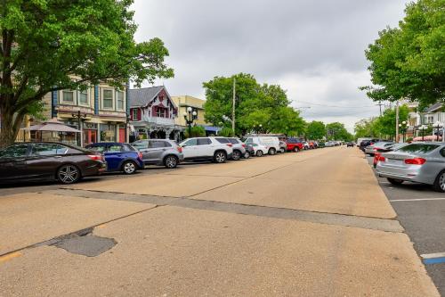 a row of cars parked on the side of a street at Walk to Downtown and Beach Ocean Grove Apartment! in Ocean Grove