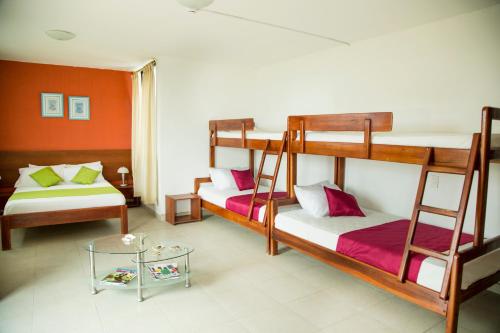 Postel nebo postele na pokoji v ubytování Hotel RC Tonsupa