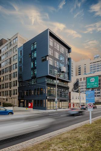 a building on the side of a city street at Sosuite at The Onyx - Museum District in Philadelphia