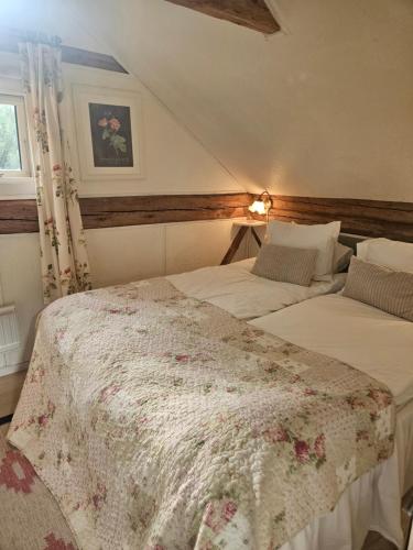 Llit o llits en una habitació de Ranch Mörby