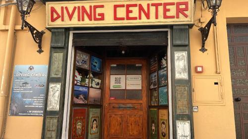 a nursing center with a sign above the door at charme suite delux in Terrasini